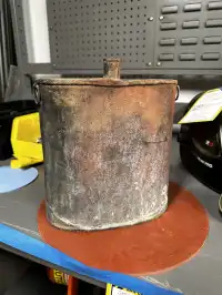 Image of Rusted Oil Container